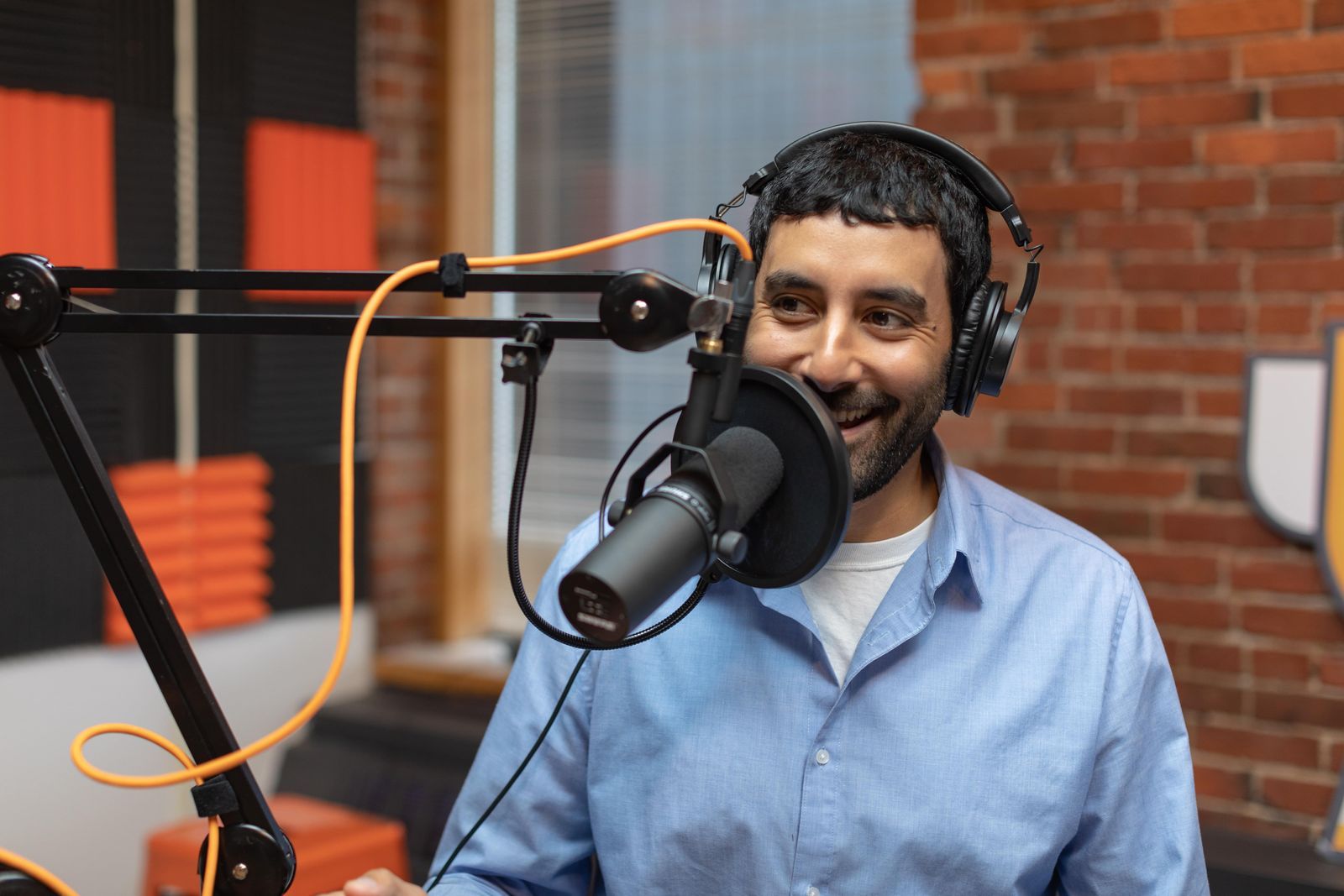 Taste Radio Producer, Editor, and Host Ray Latif smiling on the podcast